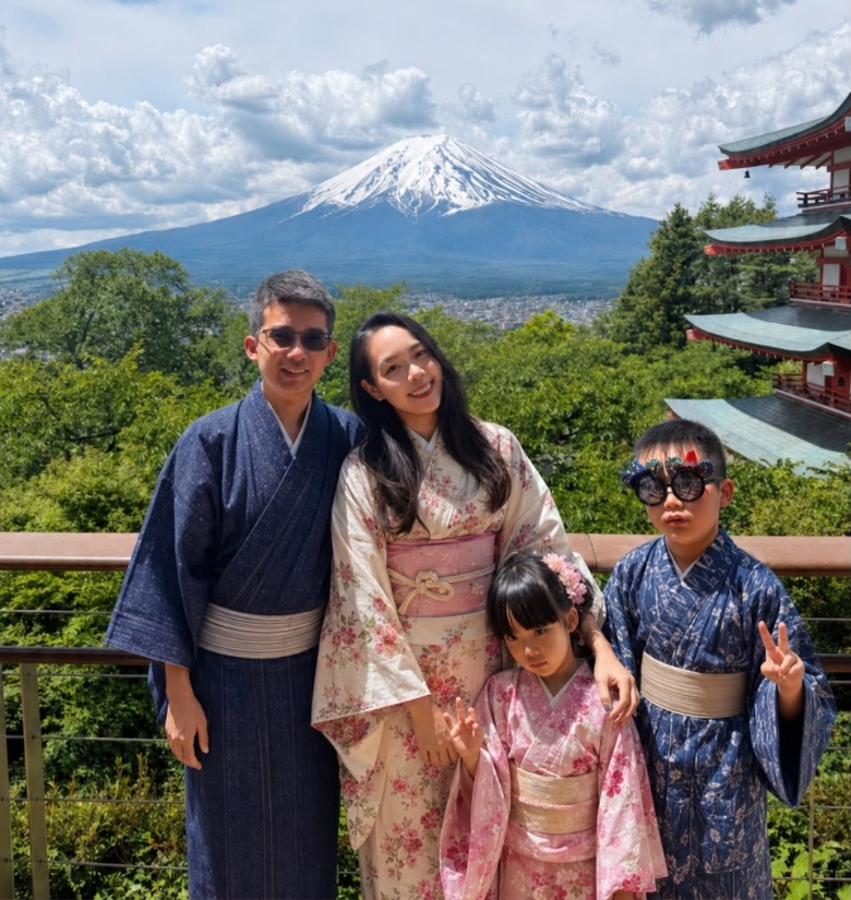 Chris Teng with his wife and their two children